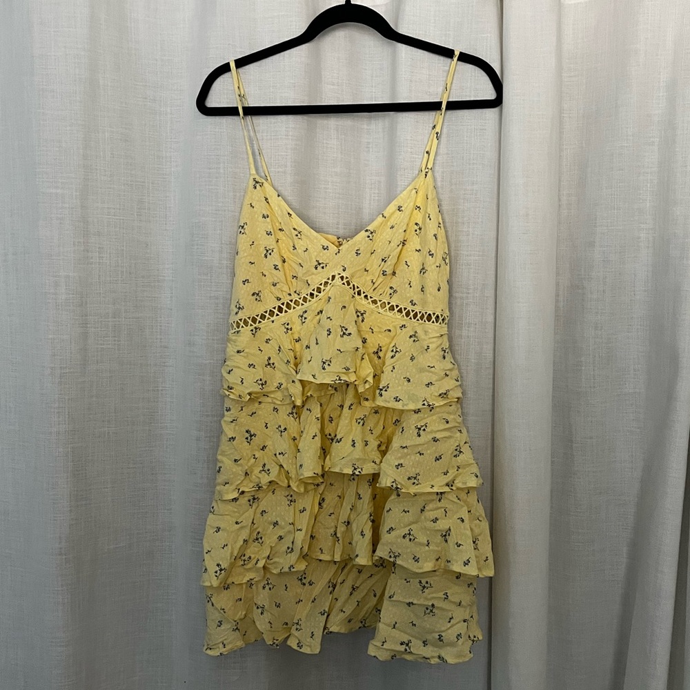 Yellow mini dress with floral detail. Forever 21. Never been worn.